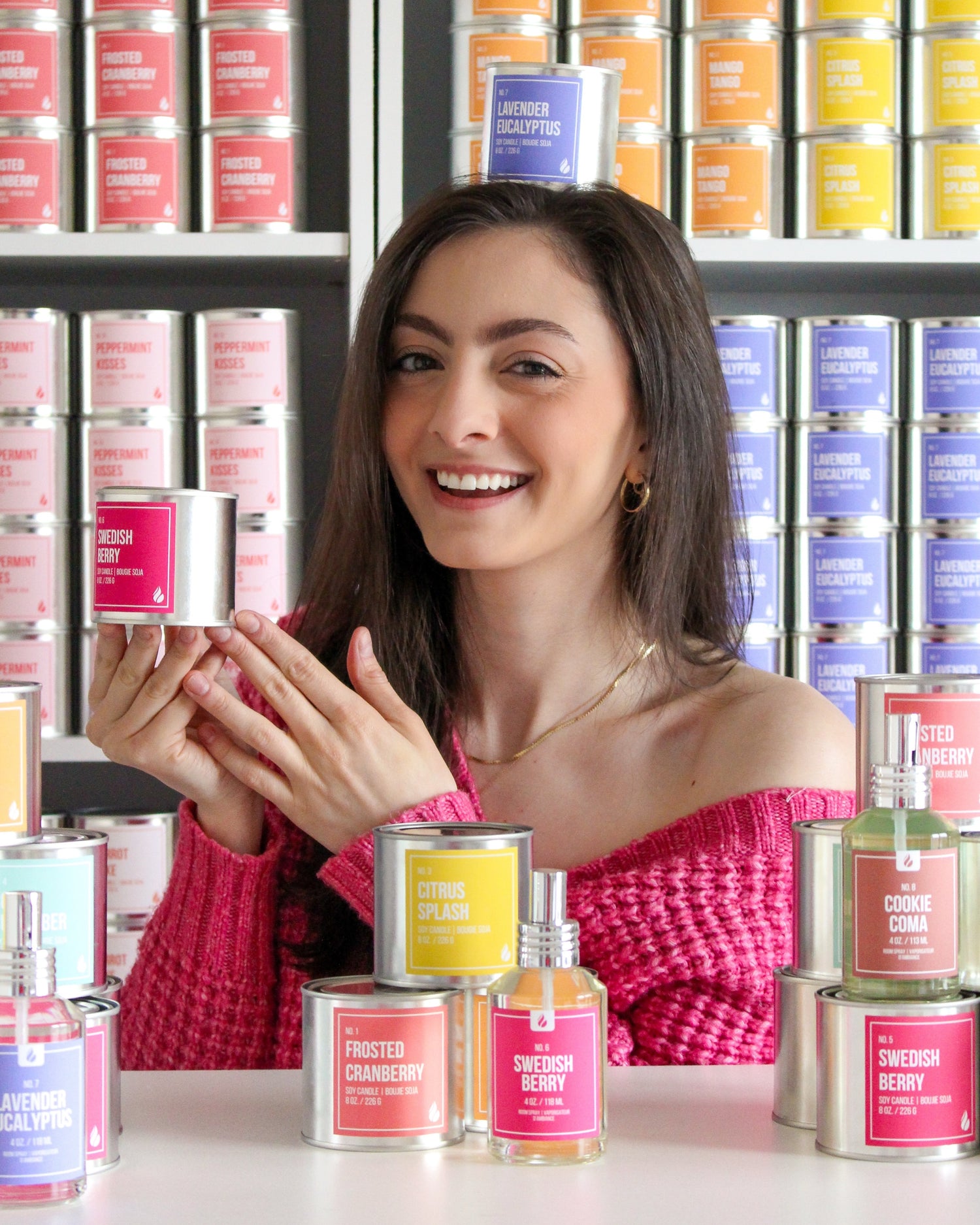 Portrait shot of Founder & CEO, Rennee Davis surrounded by The Company Flare products.